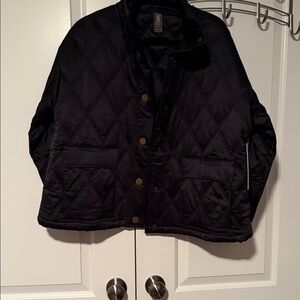 RHONE Women's Black Quilted Puffer Jacket. Silk like material water repellent.